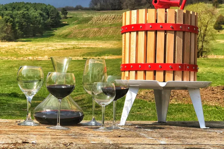 a train cake sitting on top of a wooden bench