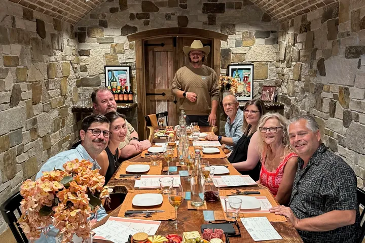 Arenda Haasnoot et al. sitting at a table in a restaurant